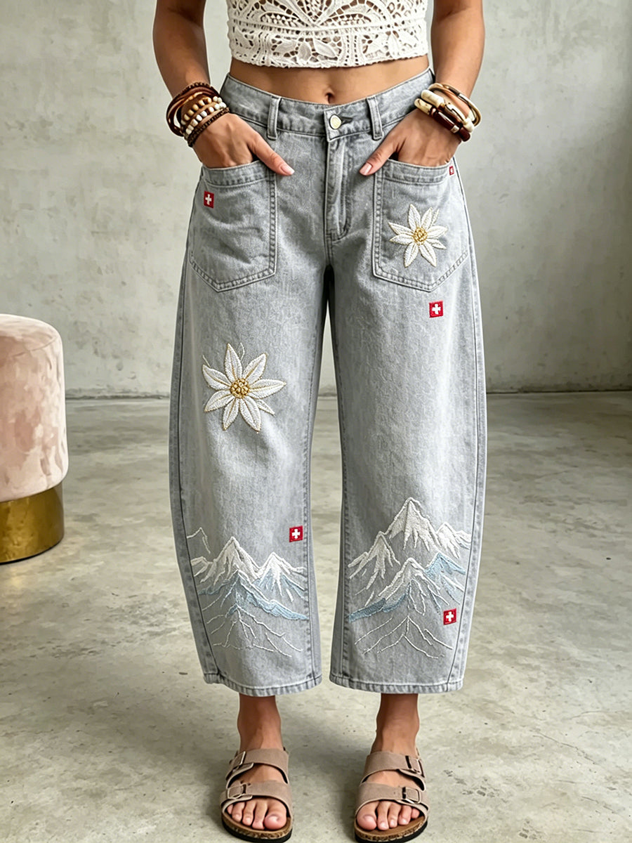 Lange Damenjeans mit floralem Stickereimuster