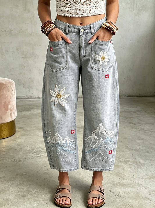 Lange Damenjeans mit floralem Stickereimuster